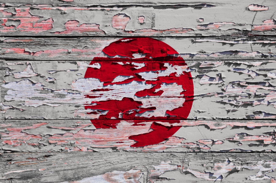 Vlag van Japan op afgebladderd stuk hout
